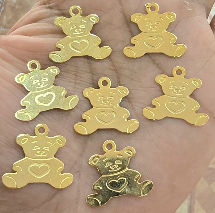 Dijes Bañados en oro 18k