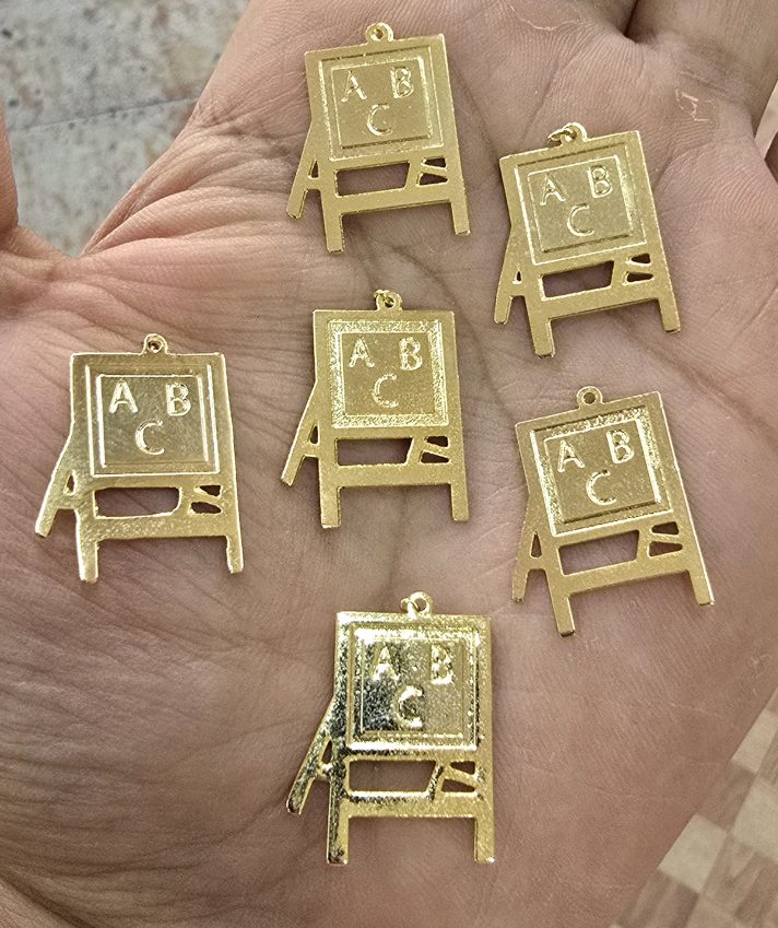 Dijes Bañados en oro 18k
