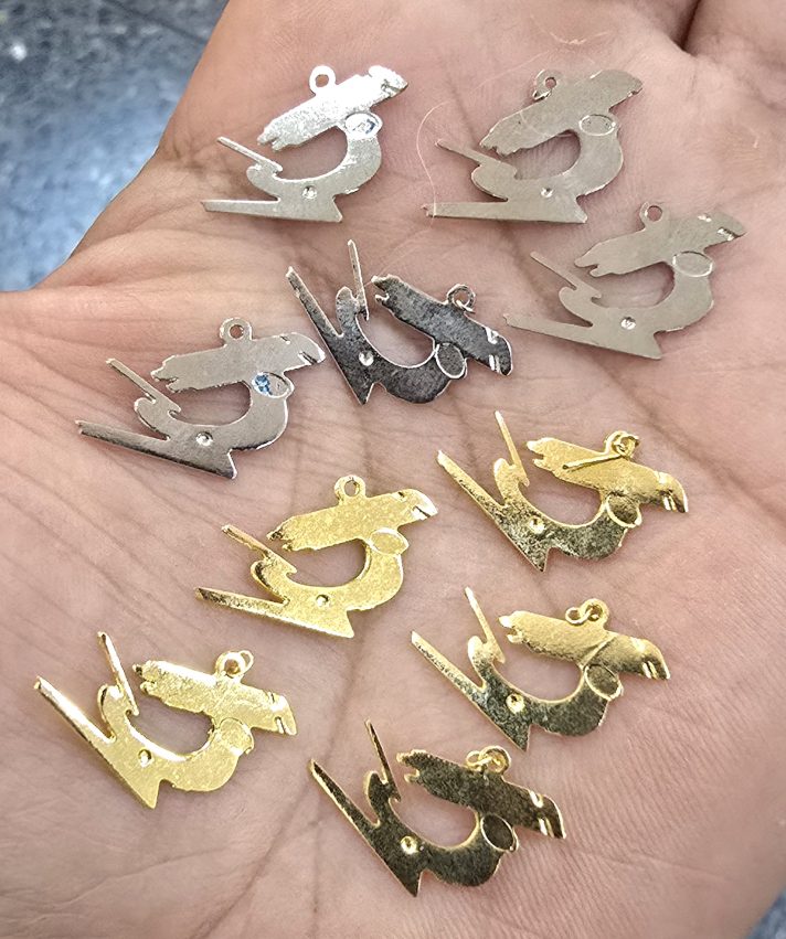 Dijes bañados en oro 18k