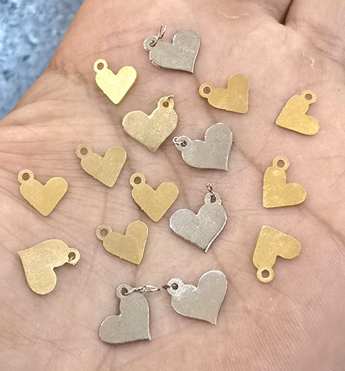 Dijes bañados en oro 18k