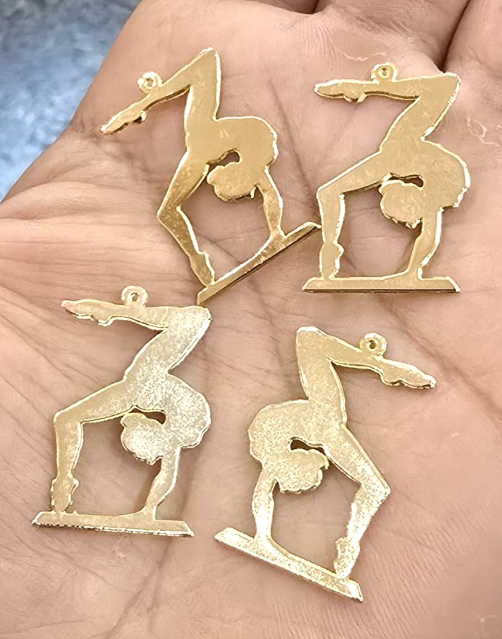 Dijes bañados en oro 18k
