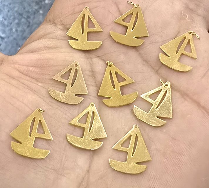 Dijes bañados en oro 18k