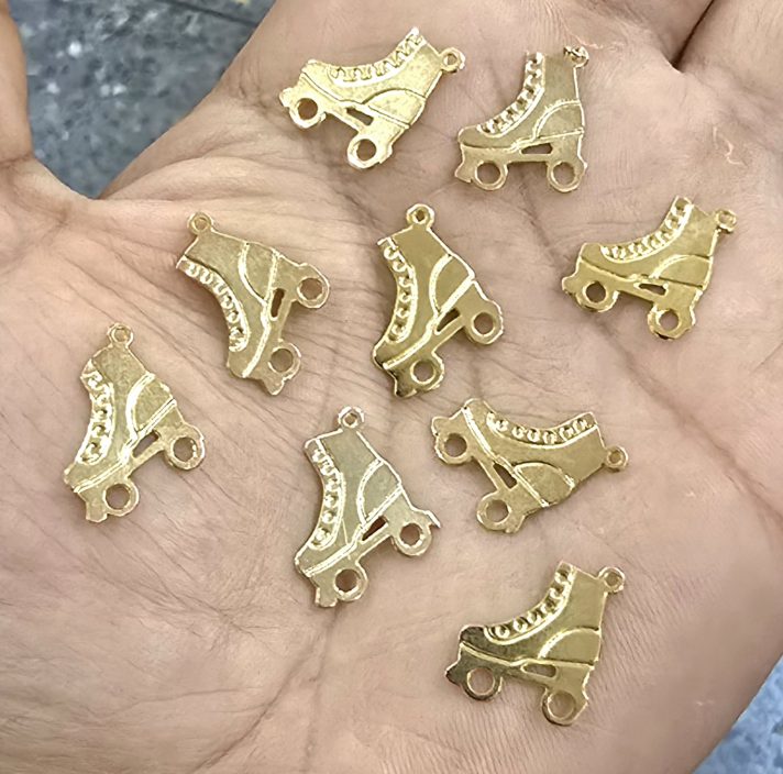 Dijes bañados en oro 18k