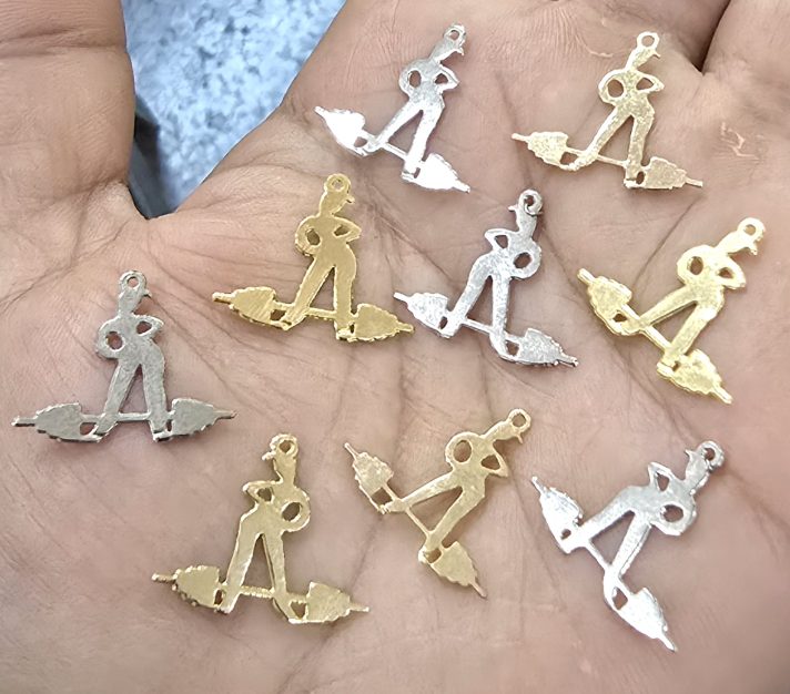 Dijes bañados en oro 18k