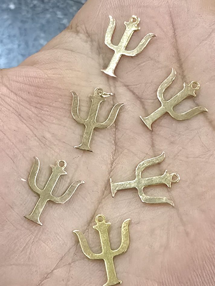 Dijes bañados en oro 18k