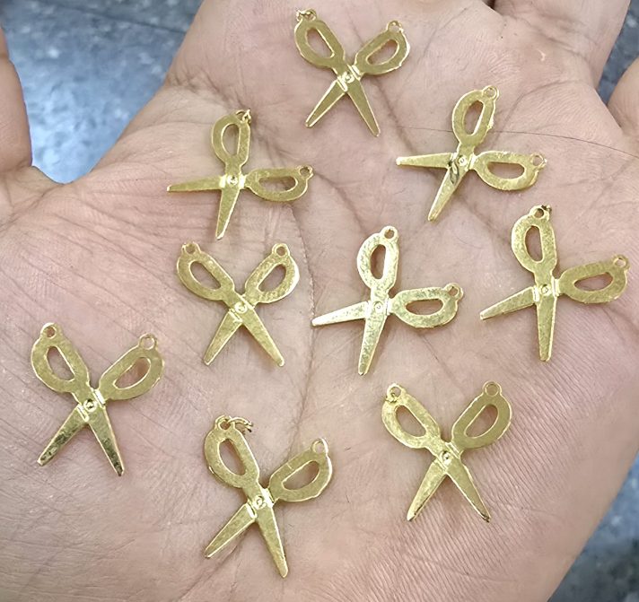 Dijes bañados en oro 18k